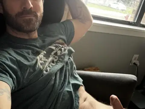 Curtains open so the neighbors can watch